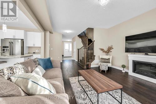 286 Dalgleish Trail, Hamilton, ON - Indoor Photo Showing Living Room With Fireplace