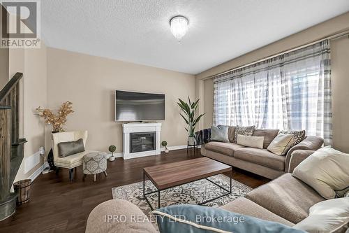 286 Dalgleish Trail, Hamilton, ON - Indoor Photo Showing Living Room With Fireplace