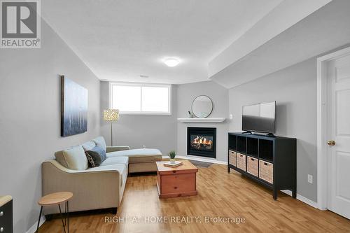 31 Scampton Drive S, Ottawa, ON - Indoor Photo Showing Living Room With Fireplace