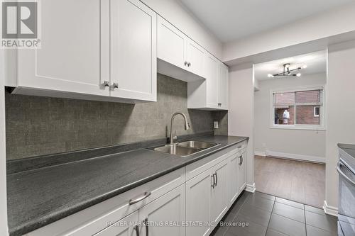 205 - 8 Pearl Street, Smiths Falls, ON - Indoor Photo Showing Kitchen With Double Sink