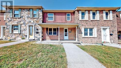 12 - 2051 Bridletowne Circle, Toronto, ON - Outdoor With Facade