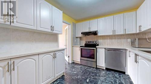 12 - 2051 Bridletowne Circle, Toronto, ON - Indoor Photo Showing Kitchen