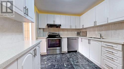 12 - 2051 Bridletowne Circle, Toronto, ON - Indoor Photo Showing Kitchen With Double Sink