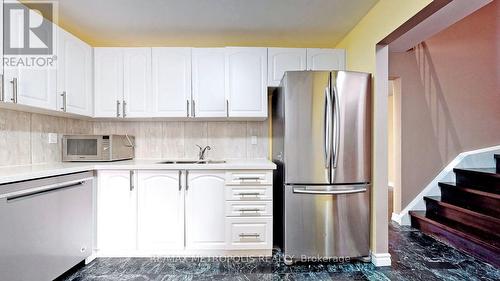 12 - 2051 Bridletowne Circle, Toronto, ON - Indoor Photo Showing Kitchen With Double Sink