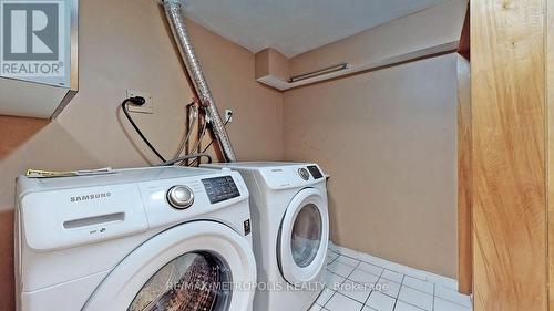 12 - 2051 Bridletowne Circle, Toronto, ON - Indoor Photo Showing Laundry Room