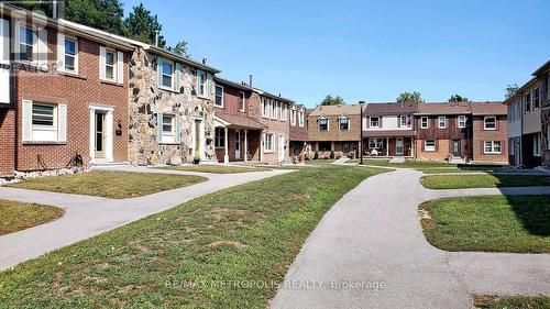 12 - 2051 Bridletowne Circle, Toronto, ON - Outdoor With Facade