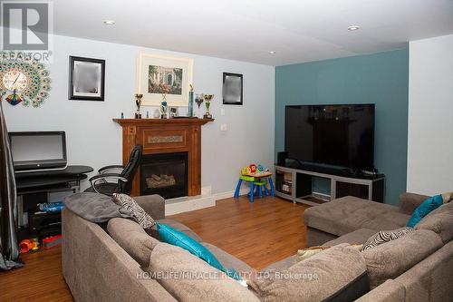 199 Garden Path, Chatham-Kent, ON - Indoor Photo Showing Living Room With Fireplace