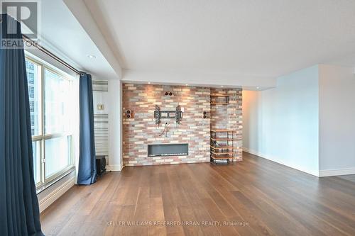 2103 - 25 The Esplanade, Toronto, ON - Indoor Photo Showing Living Room With Fireplace