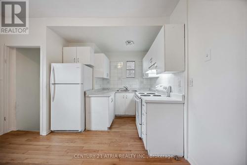 1860 Gerrard Street E, Toronto, ON - Indoor Photo Showing Kitchen With Double Sink