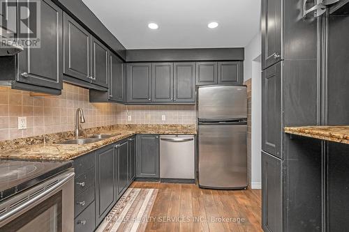 25 Westvillage Drive, Hamilton, ON - Indoor Photo Showing Kitchen With Stainless Steel Kitchen With Double Sink