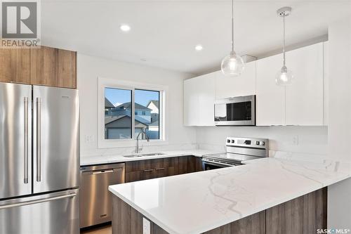 674 Mcormond Drive, Saskatoon, SK - Indoor Photo Showing Kitchen With Upgraded Kitchen