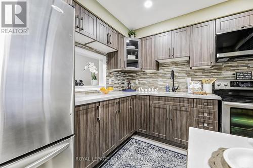 29 - 2451 Bridletowne Circle, Toronto, ON - Indoor Photo Showing Kitchen With Upgraded Kitchen