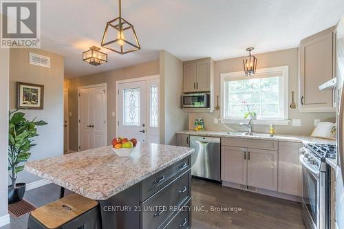 140 - 301 Carnegie Avenue, Peterborough (Northcrest), ON - Indoor Photo Showing Kitchen With Stainless Steel Kitchen With Double Sink