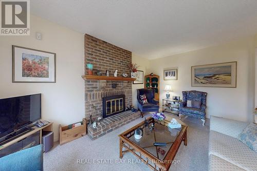 42 Gaslight Crescent, Toronto, ON - Indoor Photo Showing Living Room With Fireplace