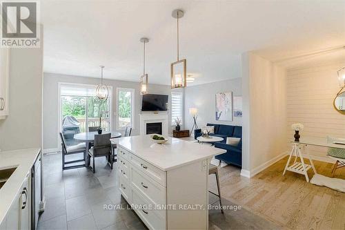 3460 Vernon Powell Drive, Oakville, ON - Indoor Photo Showing Kitchen With Fireplace