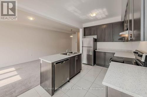 86 - 166 Deerpath Drive, Guelph, ON - Indoor Photo Showing Kitchen With Double Sink