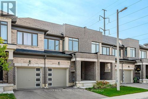 86 - 166 Deerpath Drive, Guelph, ON - Outdoor With Facade