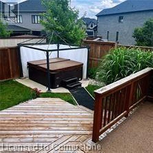 View of yard with a hot tub - 17 Hawkswood Drive, Kitchener, ON - Outdoor With Deck Patio Veranda