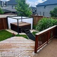 View of yard with a hot tub - 