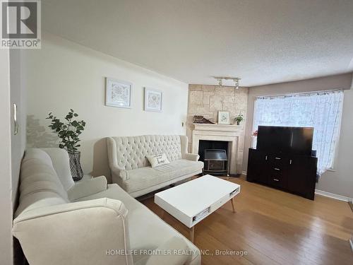 36 - 2555 Thomas Street, Mississauga, ON - Indoor Photo Showing Living Room With Fireplace