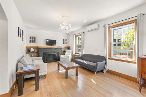 251 Duffield Street, Winnipeg, MB - Indoor Photo Showing Living Room With Fireplace