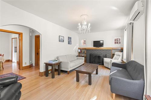 251 Duffield Street, Winnipeg, MB - Indoor Photo Showing Living Room With Fireplace