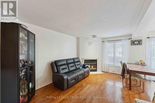 121 Ashpark Crescent, Ottawa, ON - Indoor Photo Showing Other Room With Fireplace