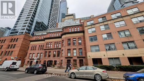 107 - 11 St Joseph Street, Toronto, ON - Outdoor With Facade