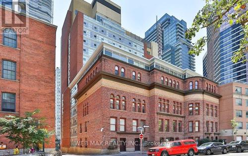 107 - 11 St Joseph Street, Toronto, ON - Outdoor With Facade