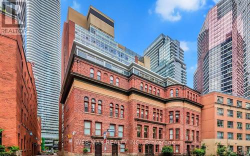 107 - 11 St Joseph Street, Toronto, ON - Outdoor With Facade