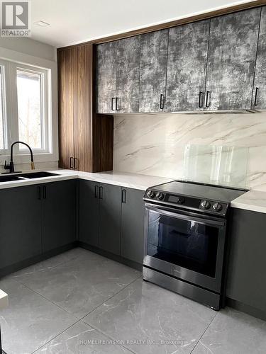 Room A - 15 Cobden Street, Toronto, ON - Indoor Photo Showing Kitchen With Double Sink