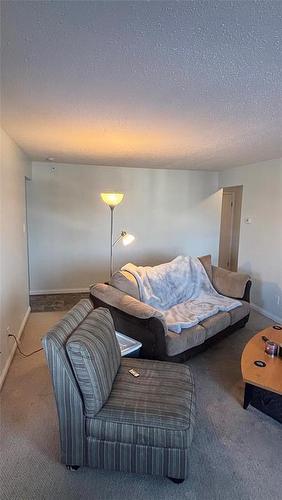 303 1583 26Th Street, Brandon, MB - Indoor Photo Showing Bedroom