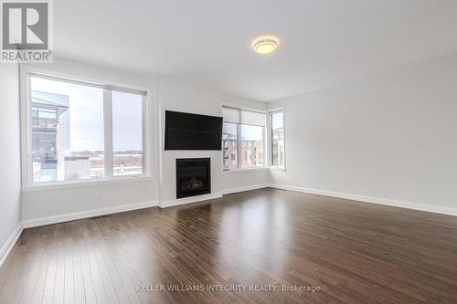 143 Boundstone Way, Ottawa, ON - Indoor Photo Showing Living Room With Fireplace