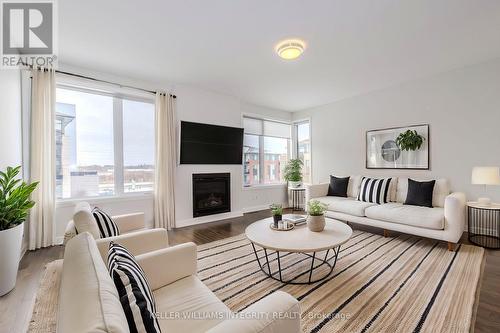 143 Boundstone Way, Ottawa, ON - Indoor Photo Showing Living Room With Fireplace