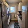 203 - 170 Bradford Street, Barrie, ON  - Indoor Photo Showing Kitchen With Stainless Steel Kitchen 