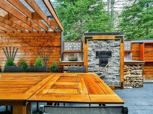 Terrasse - 55 Ch. De La Colline, Saint-Sauveur, QC - Outdoor With Fireplace