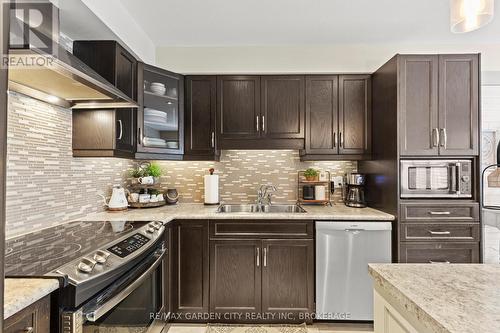 6366 Shapton Crescent, Niagara Falls (219 - Forestview), ON - Indoor Photo Showing Kitchen With Stainless Steel Kitchen With Double Sink