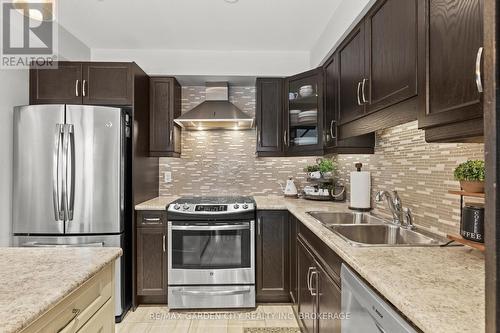 6366 Shapton Crescent, Niagara Falls (219 - Forestview), ON - Indoor Photo Showing Kitchen With Stainless Steel Kitchen With Double Sink With Upgraded Kitchen