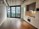 302 - 21 Lawren Harris Square, Toronto, ON  - Indoor Photo Showing Kitchen 