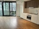 302 - 21 Lawren Harris Square, Toronto, ON  - Indoor Photo Showing Kitchen 