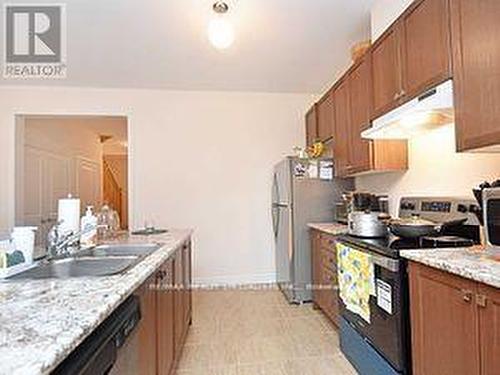 10 Brent Stephens Way, Brampton, ON - Indoor Photo Showing Kitchen With Double Sink