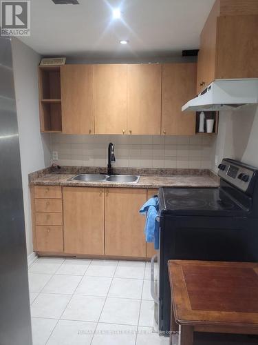 Bsmt - 7569 Magistrate Terrace, Mississauga, ON - Indoor Photo Showing Kitchen With Double Sink