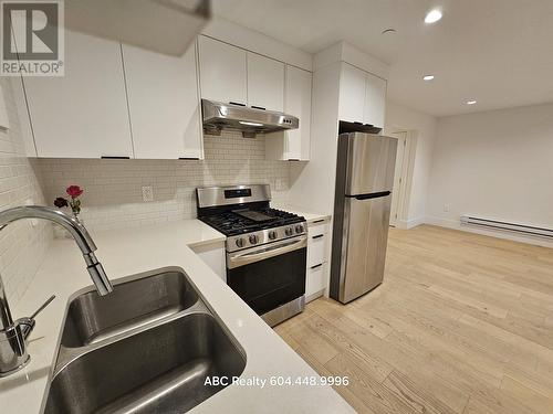 7Xx W 53 Street, Vancouver, BC - Indoor Photo Showing Kitchen With Upgraded Kitchen