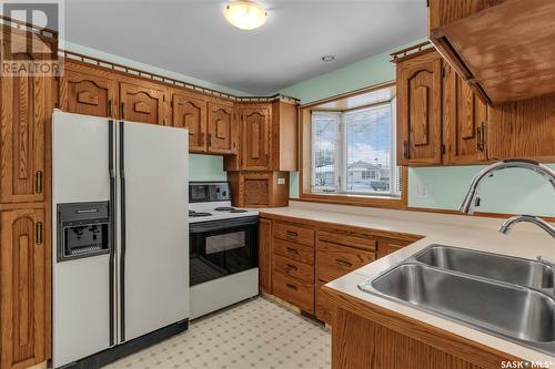 58 Hammond Road, Regina, SK - Indoor Photo Showing Kitchen With Double Sink