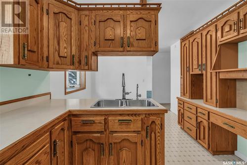 58 Hammond Road, Regina, SK - Indoor Photo Showing Kitchen With Double Sink