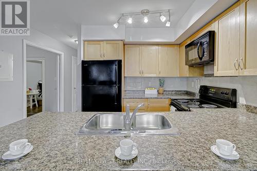 312 - 2772 Keele Street, Toronto, ON - Indoor Photo Showing Kitchen With Double Sink