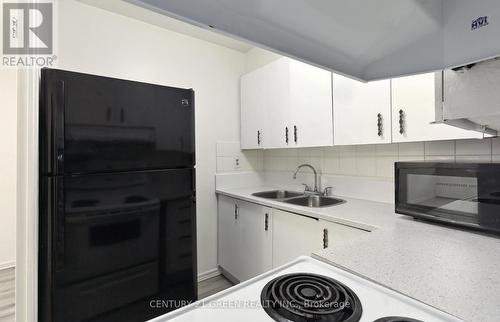 #106 - 360 Ridelle Avenue, Toronto, ON - Indoor Photo Showing Kitchen With Double Sink