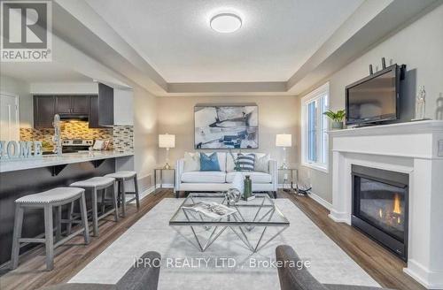 2 Stedford Crescent S, Brampton, ON - Indoor Photo Showing Living Room With Fireplace