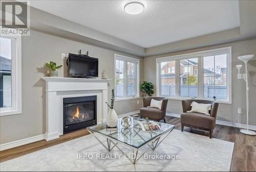 2 Stedford Crescent S, Brampton, ON - Indoor Photo Showing Living Room With Fireplace