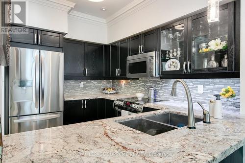 107 - 2111 Lake Shore Boulevard W, Toronto, ON - Indoor Photo Showing Kitchen With Stainless Steel Kitchen With Double Sink With Upgraded Kitchen